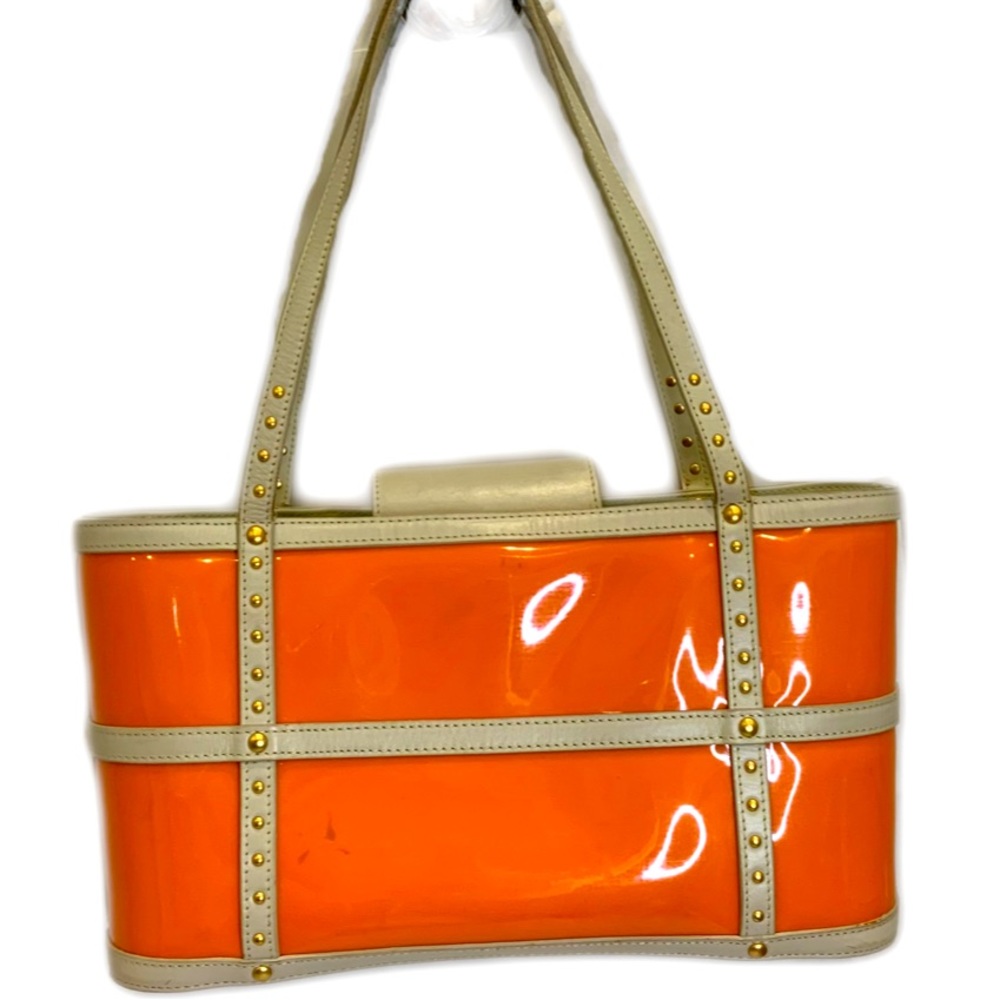 Maxx New York neon orange vinyl tote with cream poly trim and blue lining
